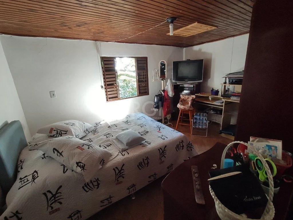 Imagem Casa para Venda - 134m², 2 dormitórios, 1 vaga - Nonoai