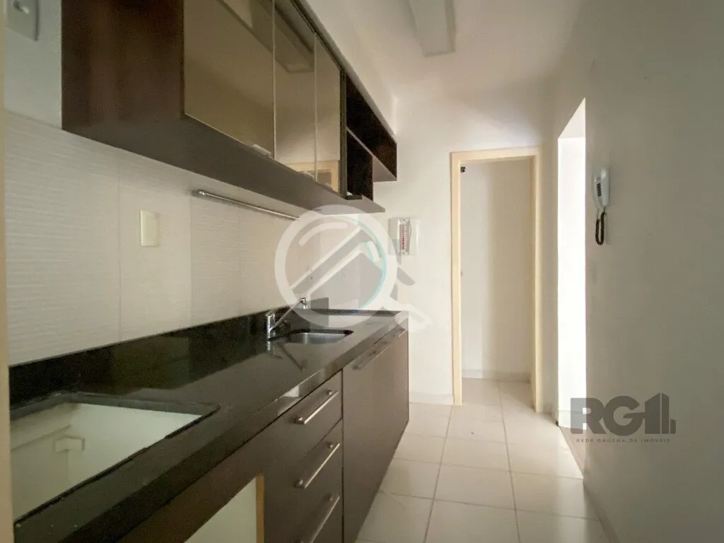 Imagem Apartamento de 75m², 2 dormitórios, living amplo em L com sacada integrada, churrasqueira na sacad...