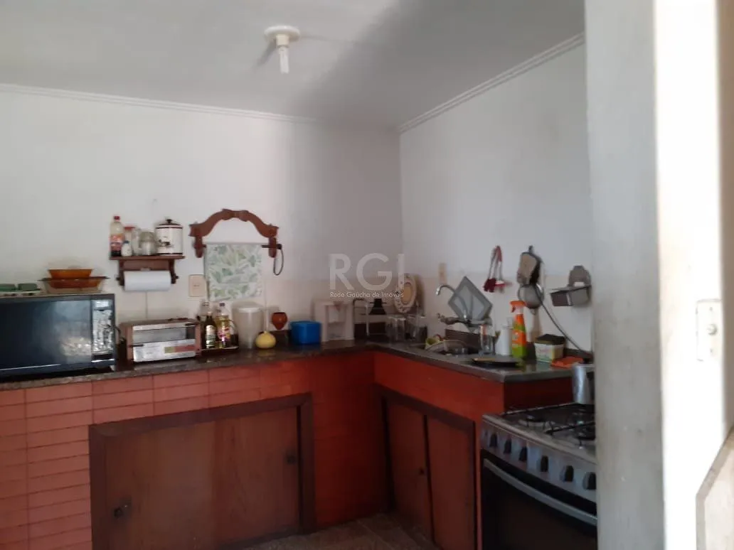 Imagem Casa para Venda - 120m², 3 dormitórios, 1 vaga - Santa Tereza