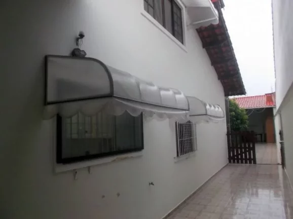 Imagem CASA COM 4 DORMITORIOS (1 SUITES)