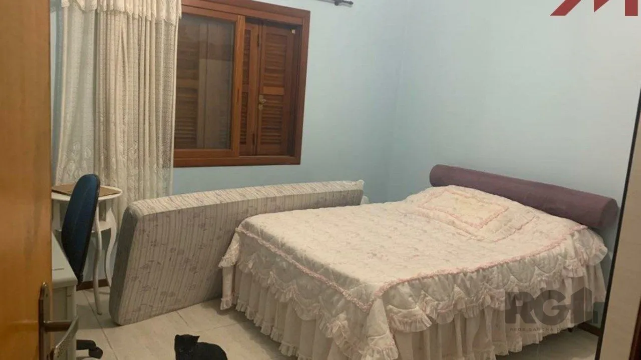 Imagem Sobrado em Trmandai com 2 suirtes, 2 banheiros, 1 vaga, churrasqueira e varanda.