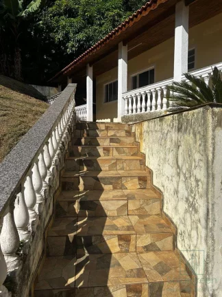 Imagem A venda propriedade com 1.400 m² de terreno e 3 imóveis - 890 mil