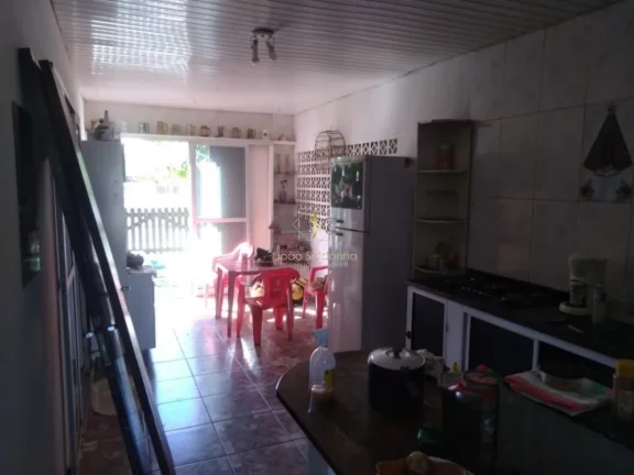 Imagem Casa para Venda em Guaratuba, rua asfaltada, próximo ao mar.