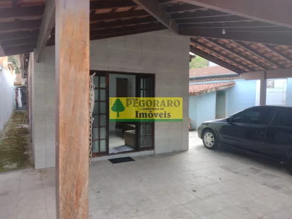 Imagem Casa à venda em Caraguatatuba-SP, bairro Rio do Ouro: 2 quartos, 2 salas, 2 banheiros, 2 vagas de garagem, 127m² - com piscina e churrasqueira!