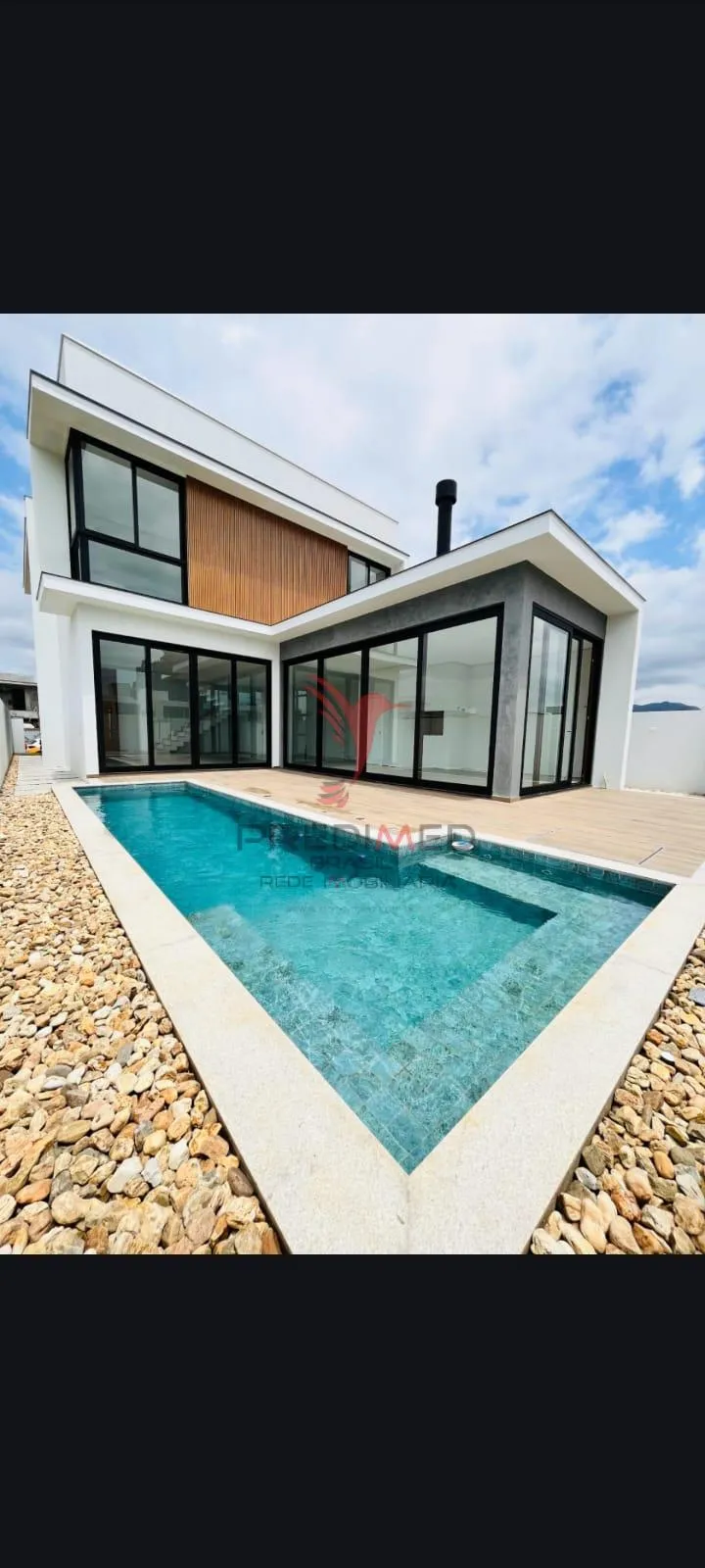 Foto do imóvel Casa alto padrão com 3 Suites , Piscina, área gourmet,em Porto Belo