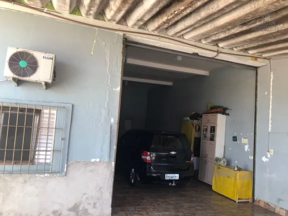 Imagem 2 casas e 1 galpão em Praia Grande, Baln. Maracanã a 300 mts da praia