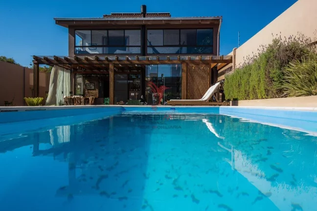 Imagem CASA DE ALTO PADRÃO, Seu Paraíso Exclusivo na Praia do Laranjal, as fotos falam por si
