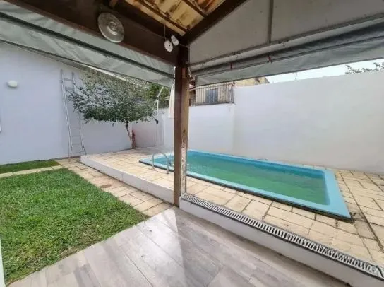 Imagem Casa 3 Dormitórios com Piscina à Venda no Guarujá - Zona Sul de Porto Alegre