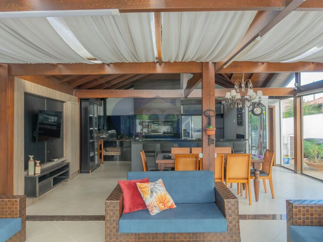 Imagem Casa de Alto Padrao com 4 Dormitorios, Piscina Aquecida e Espaço Gourmet no Centenario, em Torres/RS