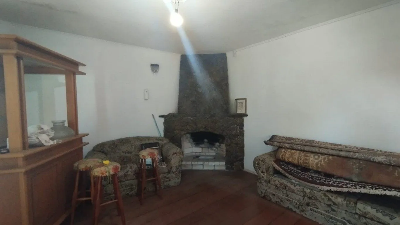Imagem Casa com 4 quartos e 257m² à venda em Guarujá, Porto Alegre.
