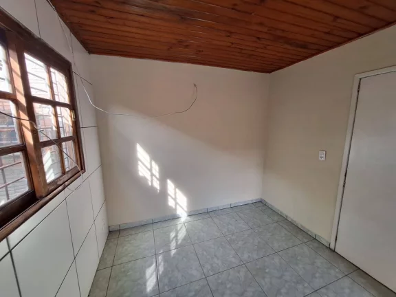 Imagem Casa com 91m², dois dormitórios, garagem, Lomba Tarumã, Viamão/RS.
