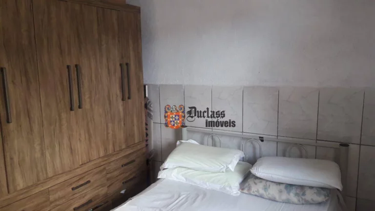 Imagem Casa com 4 dormitórios à venda por R$ 400.000 - Jardim Maraba - Mongaguá/SP