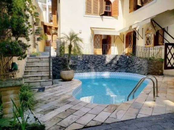 Imagem MAGNÍFICA RESIDÊNCIA * 5 SUÍTES * 5 GARAGENS * RUA TRANQUILA * SUPER SEGURA