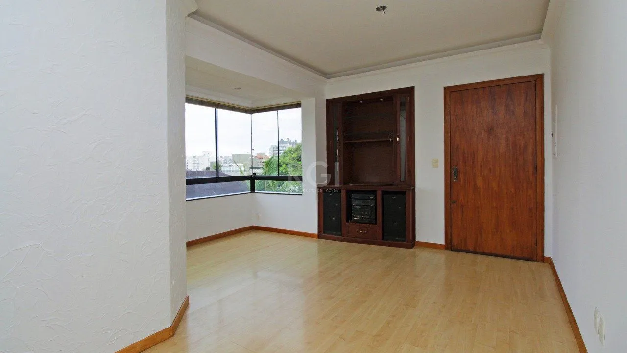 Imagem Apartamento de dois dormitórios e uma vaga de garagem na Rua Marcelo Gama, bairro Auxiliadora em Porto Alegre.