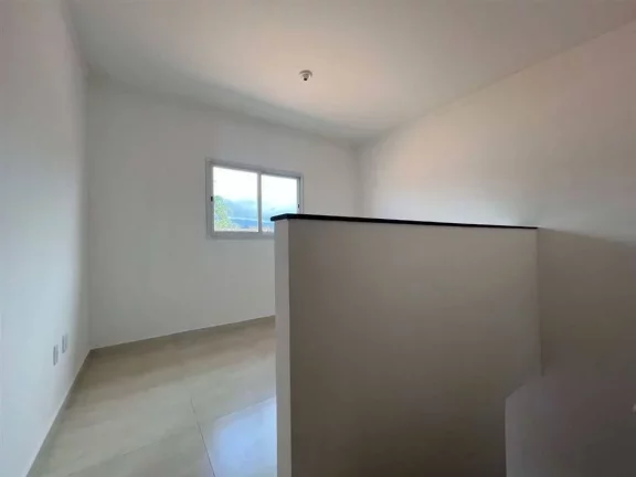 Imagem Casa com 2 dormitórios à venda, 51 m² por R$ 245.000 - Caiçara - Praia Grande/SP