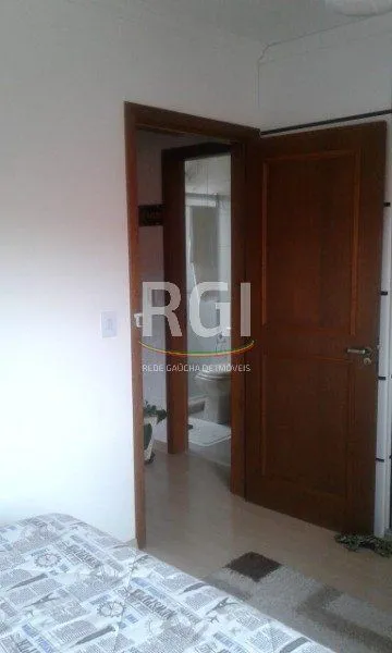 Imagem Casa Condominio para Venda - 77.6m², 2 dormitórios, 1 vaga - Partenon