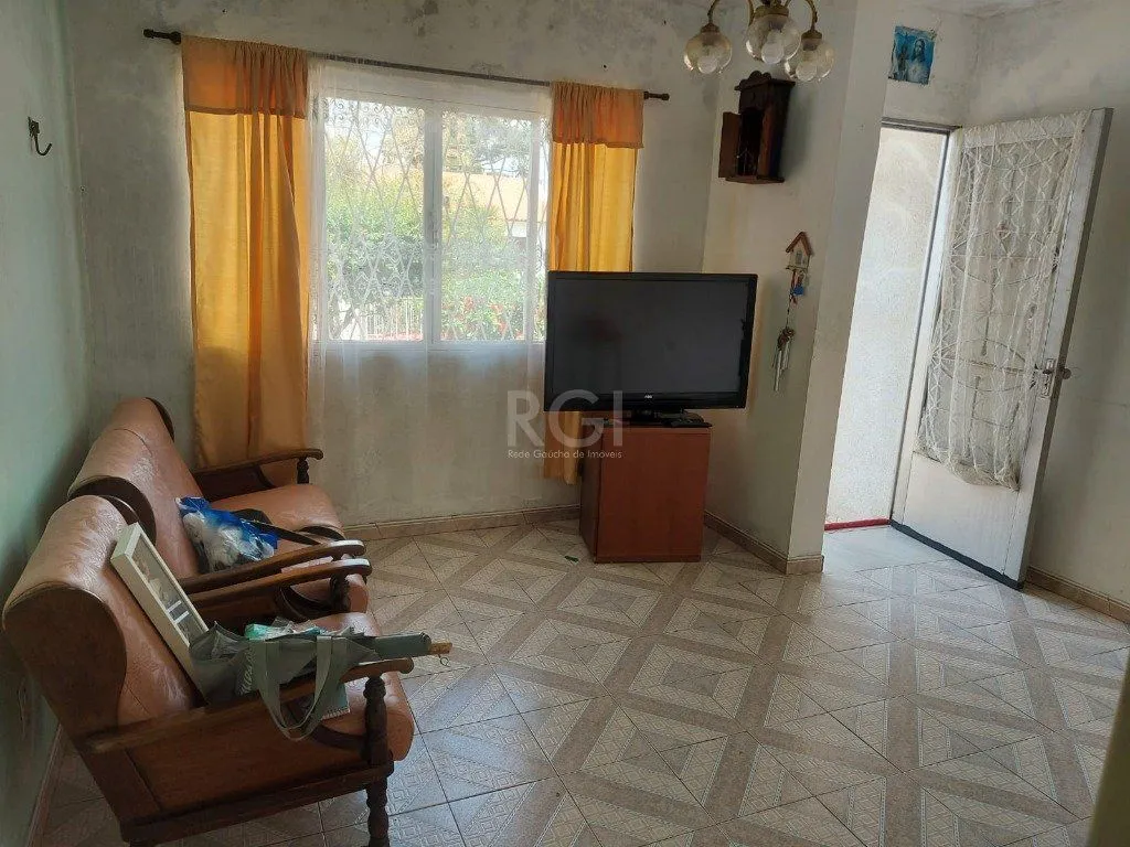 Imagem CASA COM CHURRASQUEIRA E GARAGEM PARA 2 CARROS