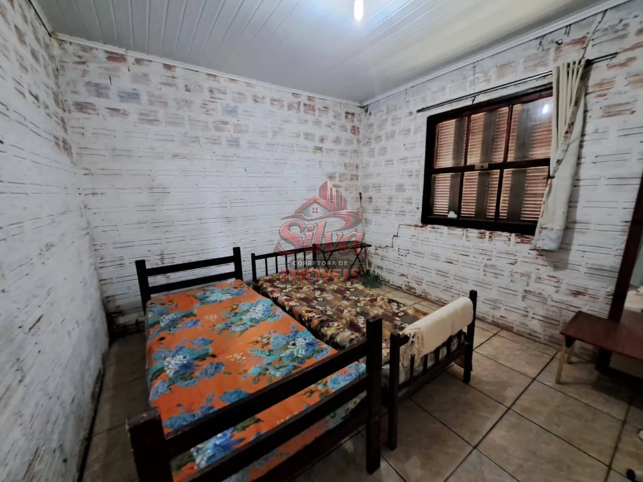 Imagem Terreno com 3 casas em Mariluz