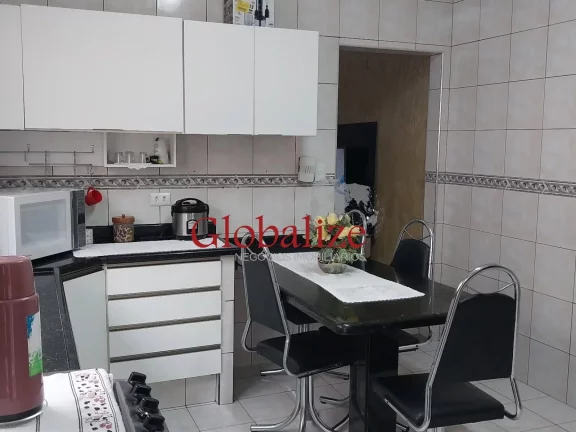 Imagem Casa térrea à venda com 125m², 2 quartos, churrasqueira, área coberta, vaga de garagem coberta por R$390.000,00 em Santos
