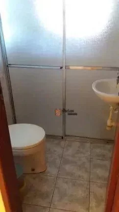Imagem Casa com 3 dormitórios à venda, 161 m² por R$ 690.000,00 - Indaiá - Bertioga/SP