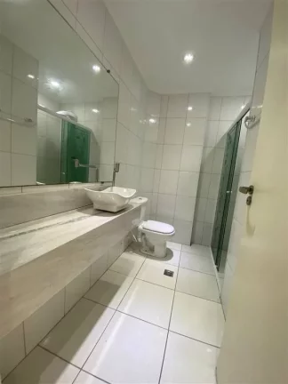 Imagem Apto 3 dormitórios, sendo 1 suíte, sacada envidraçada com churrasqueira, planejado, ar condicionado e 2 vagas de garagem