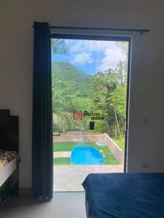 Imagem Casa com 3 dormitórios à venda, 125 m² por R$ 750.000,00 - Jardim Capricórnio - Caraguatatuba/SP