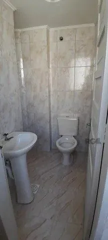 Imagem Apartamento com 3 dormitórios, 2 banheiros, 1 vaga, no bairro Cristal, Poa/RS