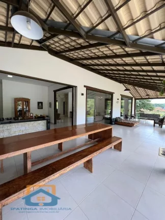Imagem Chácara / Casa alto padrão em condomínio fechado em Iapu - Condomínio Cantos da Mata
