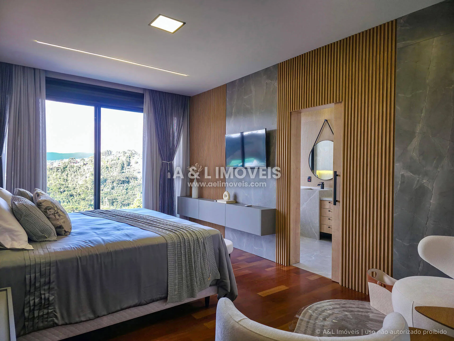 Imagem Casa à venda em Campos do Jordão | Iporanga | 4 suítes | Spa