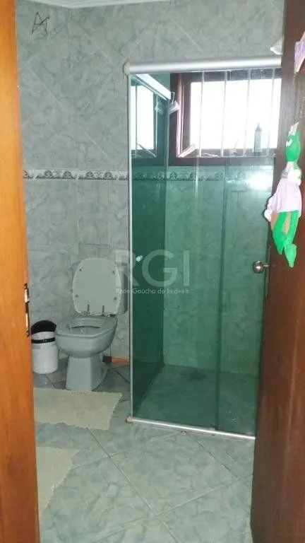 Imagem Casa com 3 dormitórios à venda, 230,11 m² por R$ 900.000,00 - Igara III - Canoas/RS