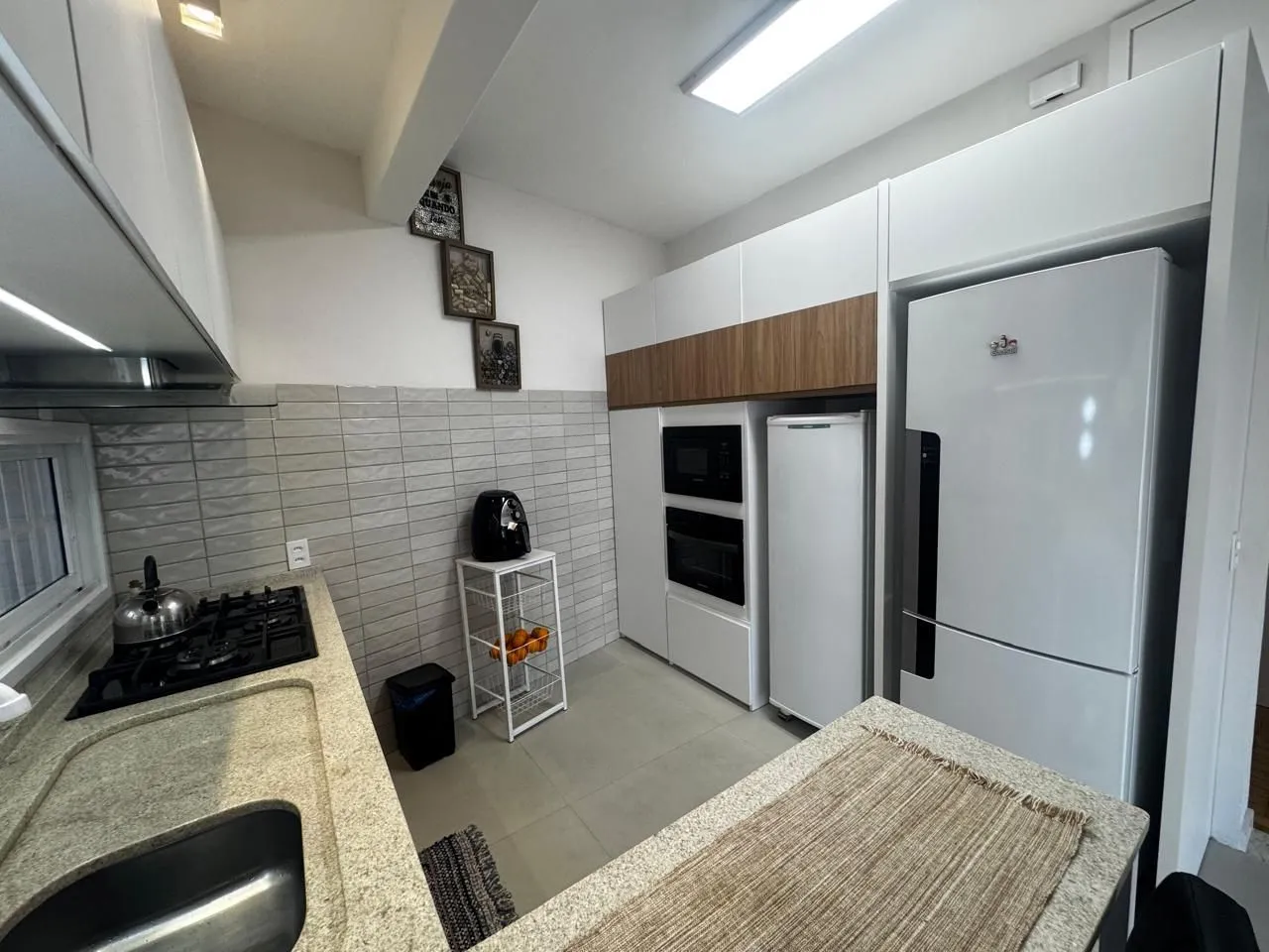 Imagem Apartamento de 2 Dormitórios totalmente reformado com churrasqueira