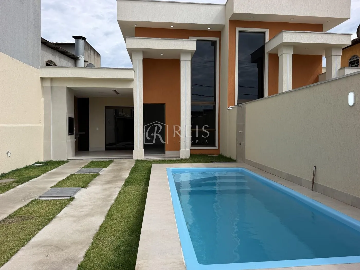 Foto do imóvel Casa para Venda em Rio das Ostras, Atlântica, 3 dormitórios, 1 suíte, 3 banheiros, 2 vagas em Rua José Luzente, 99 - Atlântica, Rio das Ostras - RJ