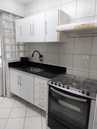 Imagem Apartamento com 4 dormitórios à venda, 113 m² por R$ 660.000,00 - Praia Pitangueiras - Guarujá/SP