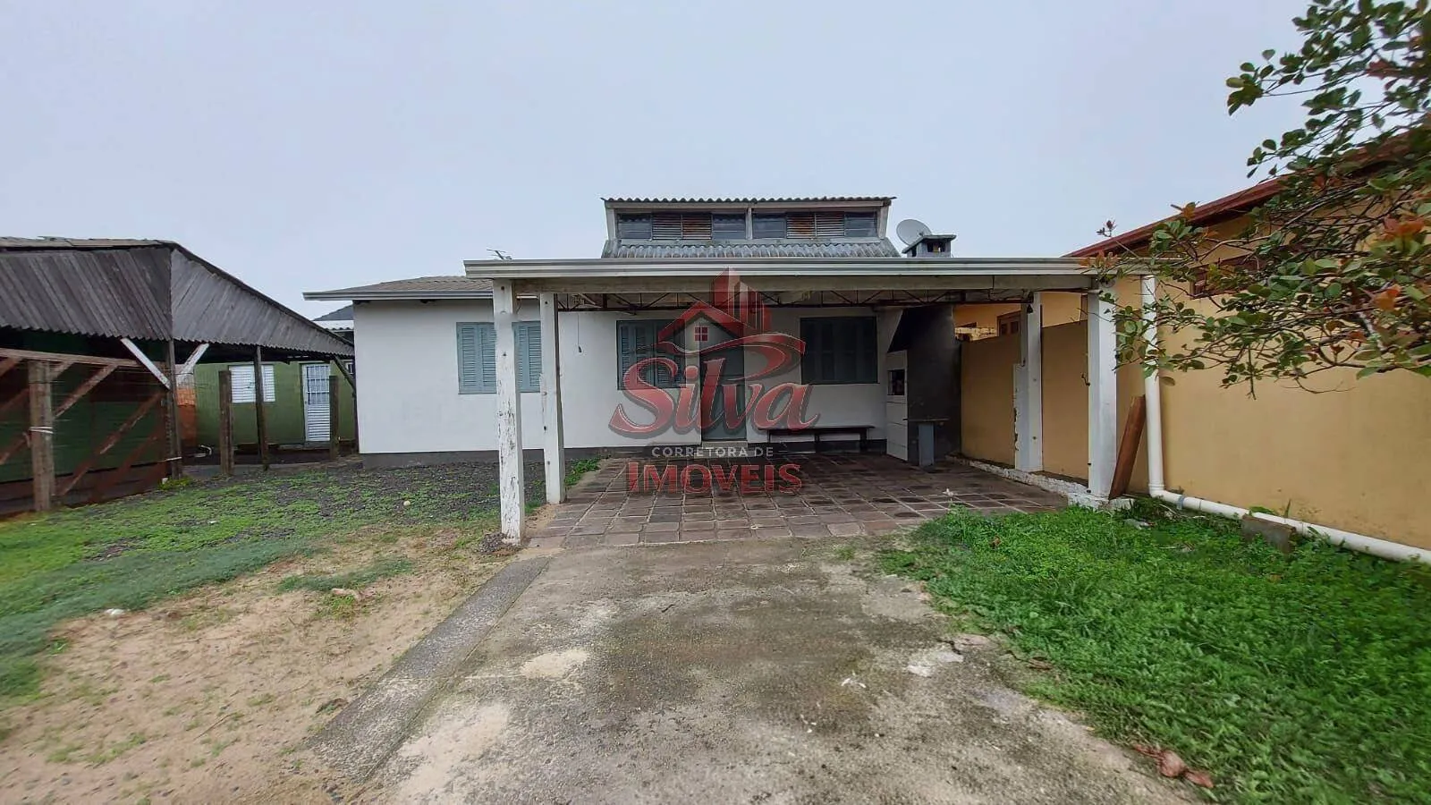 Imagem Casa com suíte à venda em Imbé com lareira e 103m²