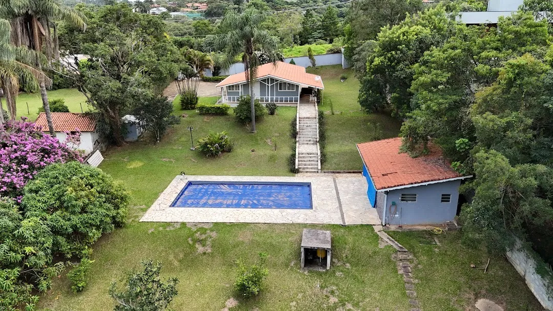 Imagem Belíssima Casa no Condomínio Porta do Sol com piscina e casa de hóspedes