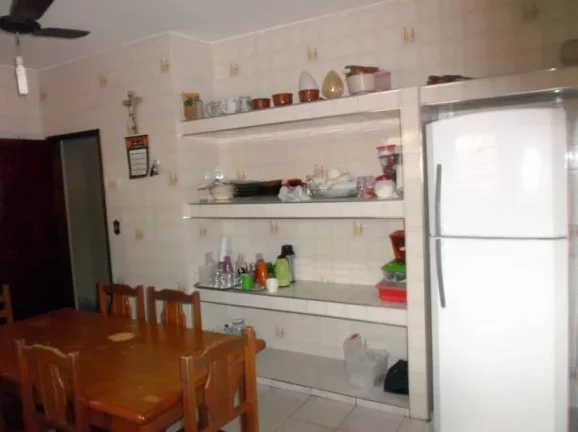 Imagem casa lado praia- tres dormitorios