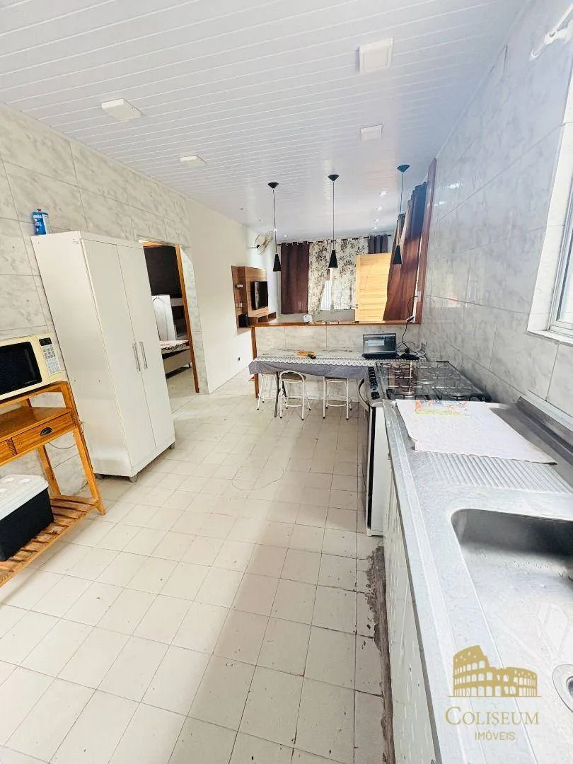 Imagem Casa com 3 dormitórios à venda por R$ 770.000,00 - Jardim Anhangüera - Praia Grande/SP