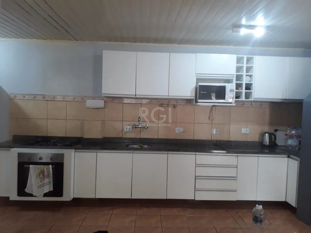 Imagem Casa para Venda - 120m², 2 dormitórios, 4 vagas - Cavalhada