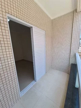 Imagem Casa com 2 dormitórios à venda, 70 m² por R$ 398.000 - Caiçara - Praia Grande/SP