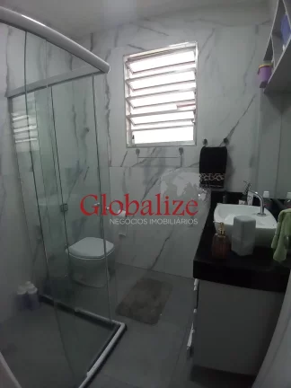 Imagem Casa em Vila à venda com 2 quartos, 2 banheiros, churrasqueira na Vila Mathias em Santos por R$426.000,00