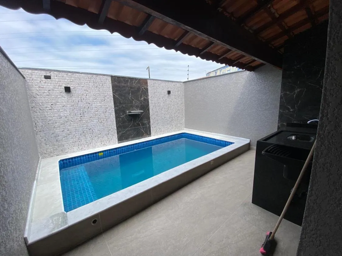 Imagem LINDA CASA NOVA COM PISCINA NO VERDE MAR