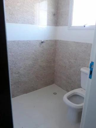 Imagem CASA ASSOBRADADA EM CONDOMIINIO COM SEGURANÇA 24 HS