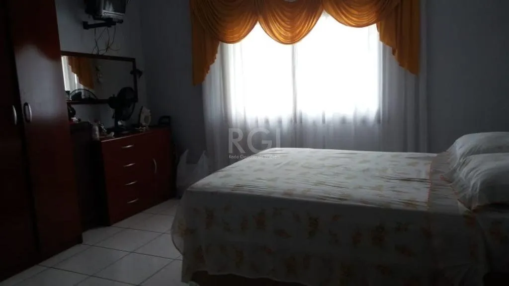 Imagem Casa com 3 dormitórios à venda, 230,11 m² por R$ 900.000,00 - Igara III - Canoas/RS