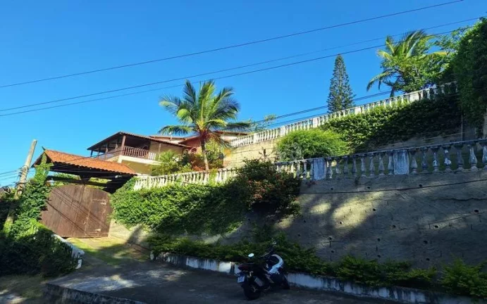 Imagem Belíssima casa de 7 quartos a venda no Bosque do Peró em Cabo Frio.