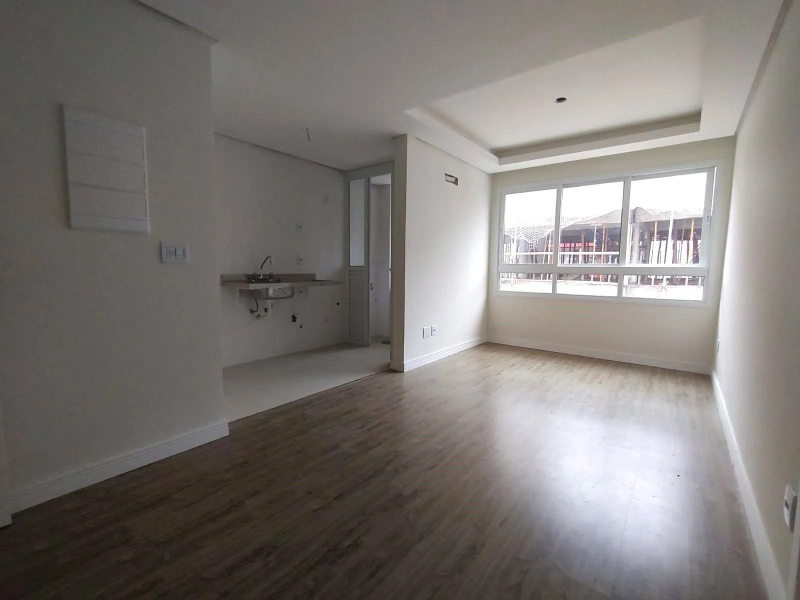 Imagem APARTAMENTO 1 DORMITÓRIO COM SUÍTE, COZINHA AMERICANA, LAVABO E AMPLO LIVING NO BOM FIM!