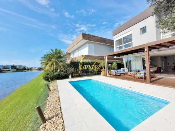Imagem Casa condomínio com 05 suites e piscina aquecida