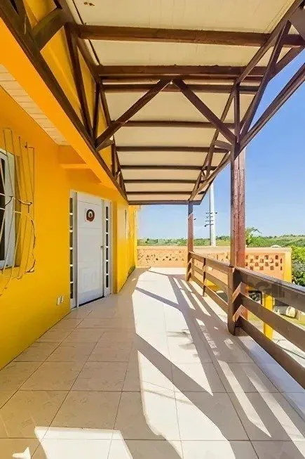 Imagem casa de 4 dormitórios, no bairro Lomba do Pinheiro