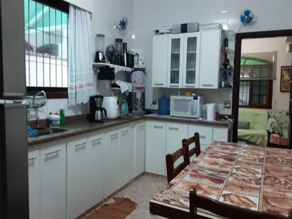 Imagem Sobrado com 4 dormitórios à venda, 216 m² por R$ 750.000,00 - Caiçara - Praia Grande/SP