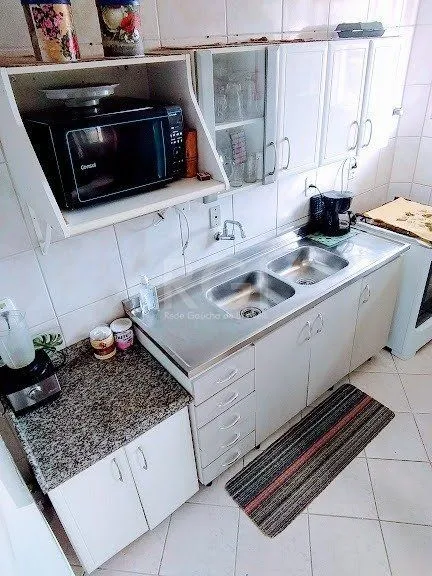 Imagem Apartamento para Venda - 88.61m², 4 dormitórios, 1 vaga - Menino Deus
