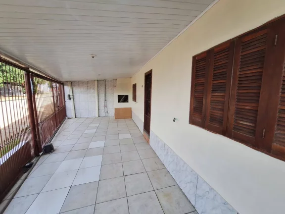 Imagem Casa com 91m², dois dormitórios, garagem, Lomba Tarumã, Viamão/RS.